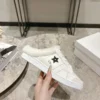 Dior Shearling Mules