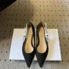 Dior Pointed-Toe Bow-Detail Pumps