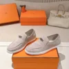 Hermes Suede Lace-Up Studded Loafers