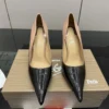 Christian Louboutin Patent Leather Pumps