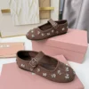 Miu Miu Buckle Crystal-Embellished Mary Jane Shoes