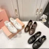 Miu Miu Lace-Up Ballet Flats