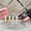 Miu Miu Crystal-Embellished Pumps