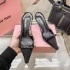 Miu Miu Crystal-Embellished Pumps