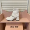 Miu Miu Patent Leather Buckle Chain-Detail Ankle Boots