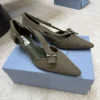 Prada Canvas Pointed-Toe Buckle Pumps