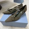 Prada Canvas Pointed-Toe Buckle Pumps
