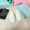 Prada Lace-Up Mules
