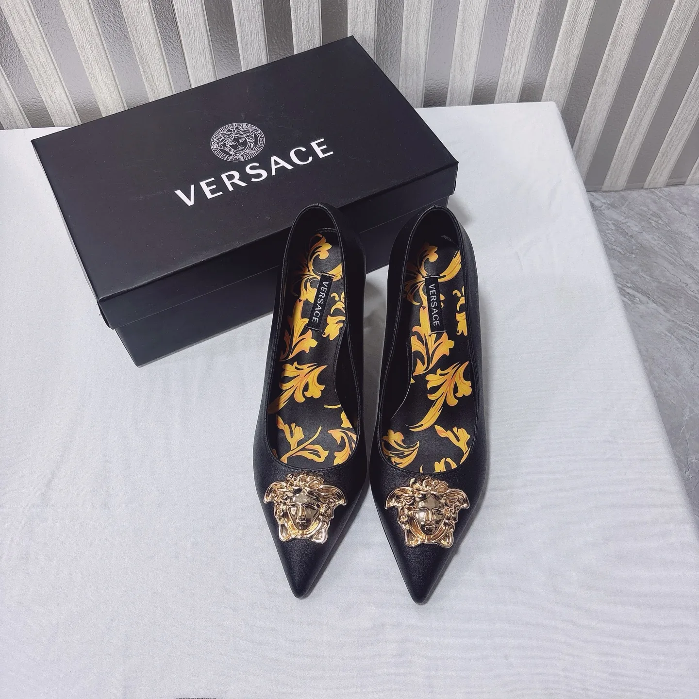 Versace Flats