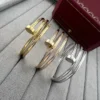 Cartier Triple-Wrap Polished Nail Bangle Bracelet