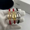 Fred Horseshoe Red Cord Bracelet