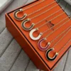 Hermes Horseshoe Pendant Necklace