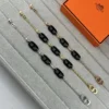 Hermes Black Onyx Anchor Link Polished Bracelet