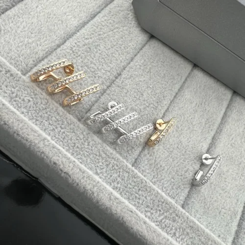 Messika Asymmetric Stud Earrings