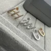 Messika Asymmetric Stud Earrings
