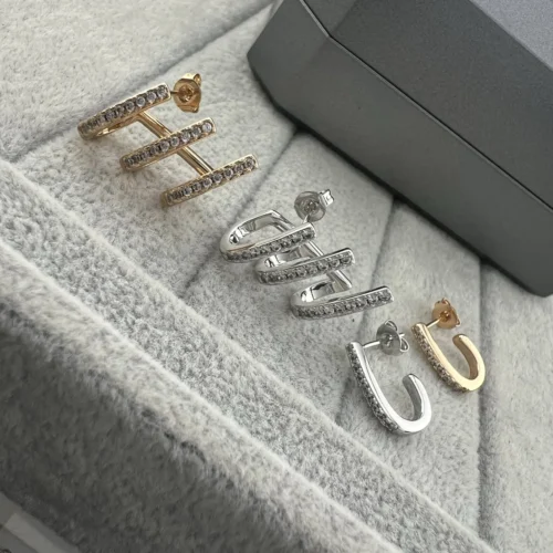 Messika Asymmetric Stud Earrings