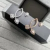 Messika Teardrop Asymmetric Stud Earrings