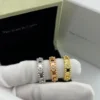 Van Cleef & Arpels Four-Motif Stone-Accented Ring