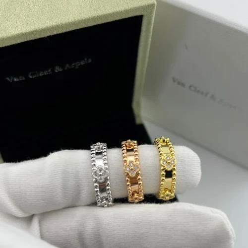 Van Cleef & Arpels Four-Motif Stone-Accented Ring