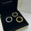 Van Cleef & Arpels Four-Motif Stone-Accented Ring