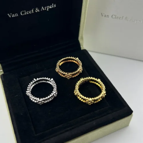 Van Cleef & Arpels Four-Motif Stone-Accented Ring