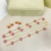 Van Cleef & Arpels Pink Stone Five-Motif Earrings